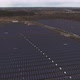 Revealing Aerial View Over Field of Solar Battery Cells in Winter - VideoHive Item for Sale
