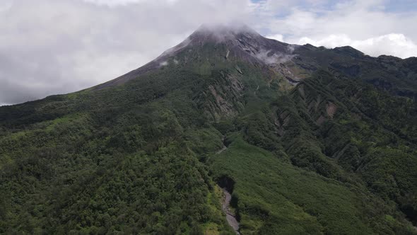 Aerial view of active Merapi mountain with clear sky in Indonesia alt