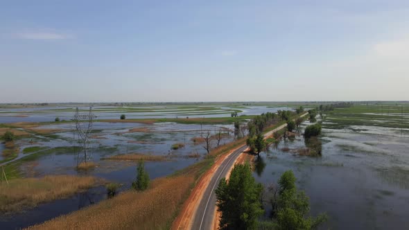 Car Road at Flood Plain at Volga River