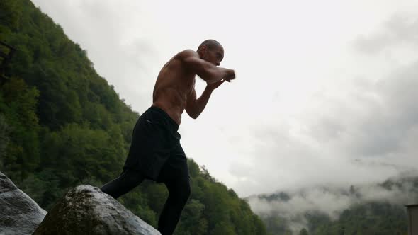 Sporty and Healthy Lifestyle of Middle Aged Man Training in Nature alt