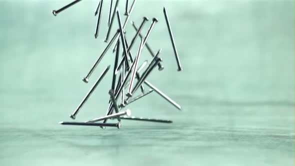 The Nails Slowly Fall on the Table alt