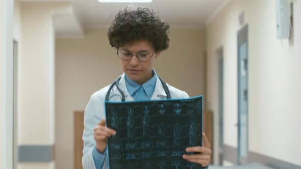 Surgery examine x-ray image in hospital corridor