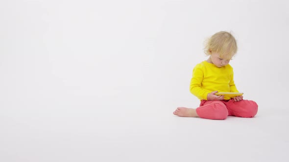 Cute Little Child Using Smartphone Watching Educational Video White Background