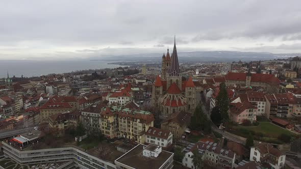 Aerial shot of Lausanne Cathedral and its surroundings alt