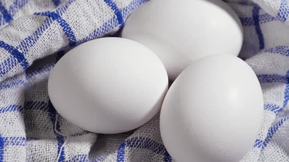 Eggs at the Table Rotation White and Fresh Chicken Eggs alt