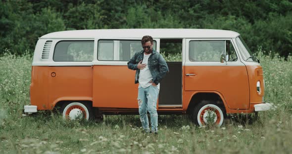 Energetic Young Guy Dancing in Front of a Retro alt