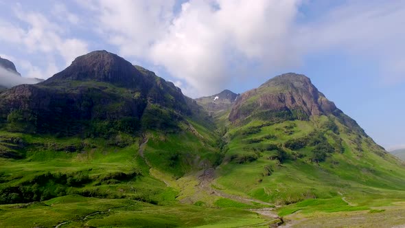 Stunning sunrise over the mountains of Glencoe in spring, Scotland, UK alt