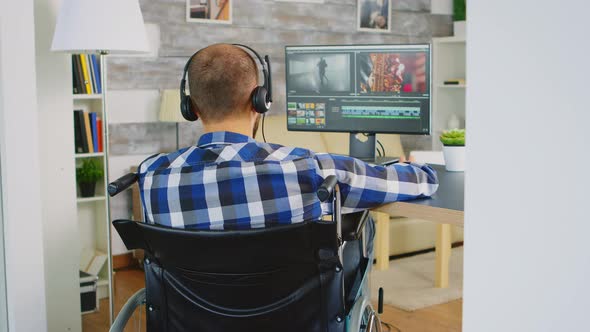 Video Editor in Wheelchair alt