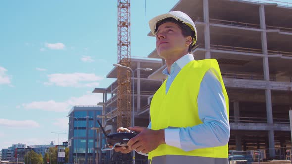 Workplace of freelance worker at home office. Young man works using computer. alt