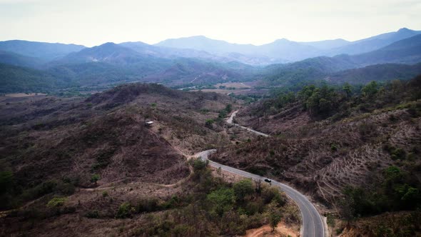 Aerial View Driving Through Mountain Pass