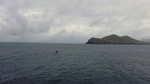 A Lightweight Modern Fishing Boat Shot From Above While Travelling Fast