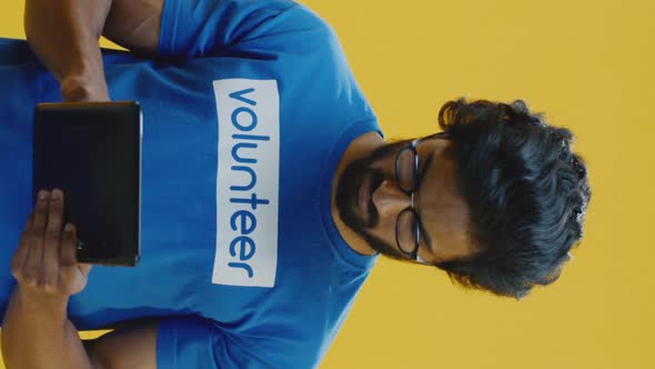 Young Man with Clipboard alt