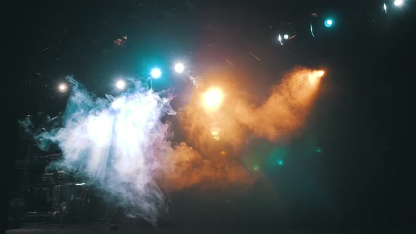 Blue flare light beam with smoke and dust particle effect abstract background. concert lighting.