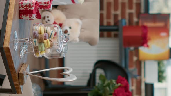 Vertical Video Empty Living Room with Nobody in It Having Table with Romantic Gift alt
