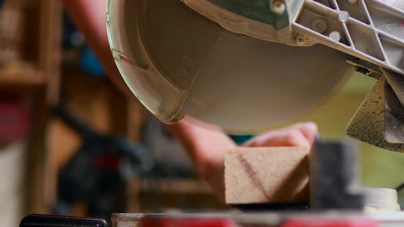 Carpenter Young Working with Wood in Workshop alt