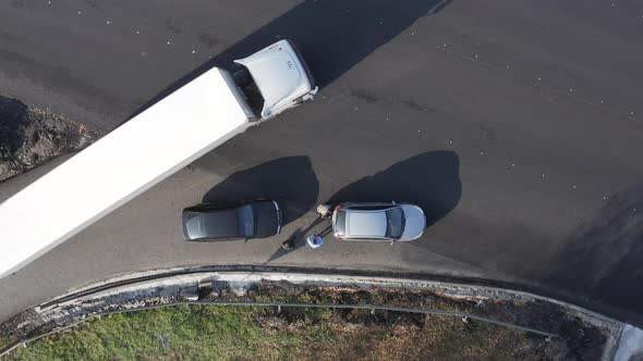 Drivers Check for Bumper Damage alt
