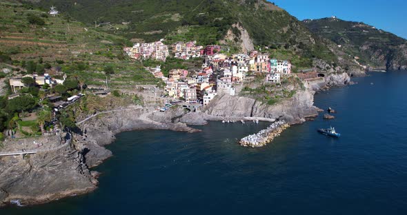 Beautiful View Of Small-town On A Coastal Cliff. Aerial Shot Of Manarola. alt