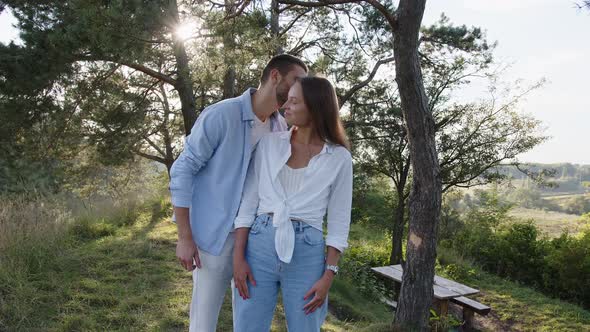 Closeup Romantic People Hugging in Park alt