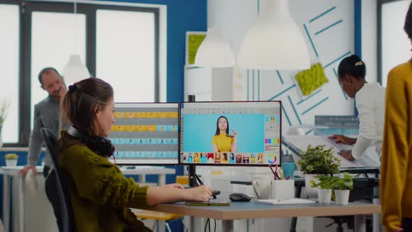 Professional Woman Retoucher Edits Assets in Creative Media Agency Office alt