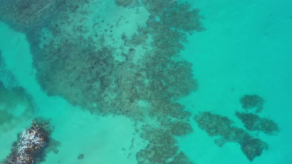 Aerial View High Above Beautiful Caribbean Ocean With Coral Reef