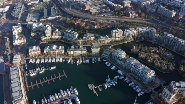 Aerial shot flying over the marina and shipyards of Cape Town