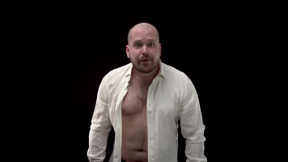 Bald Bearded Very Angry Man Swears at Camera. Emotions Are Off Scale, Aggression. A Guy in alt