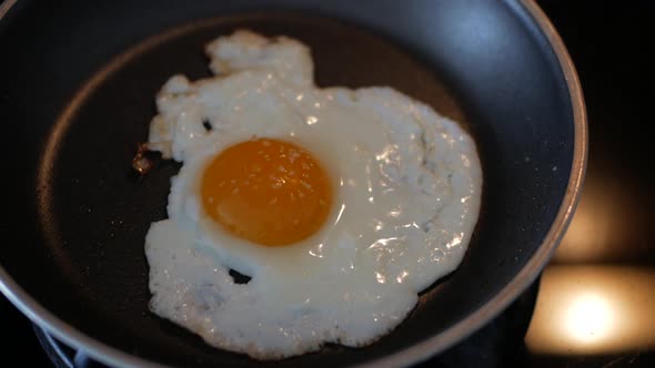Cooking Sunny Side Up Egg In A Pan - Food For Breakfast - close up alt