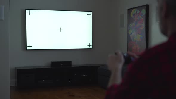 Man Playing Video Game in the Dark alt