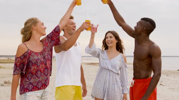 Friends Clinking Non Alcoholic Drinks on Beach  alt