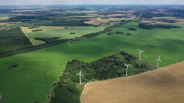 Windmills in Summer in a Green Field alt