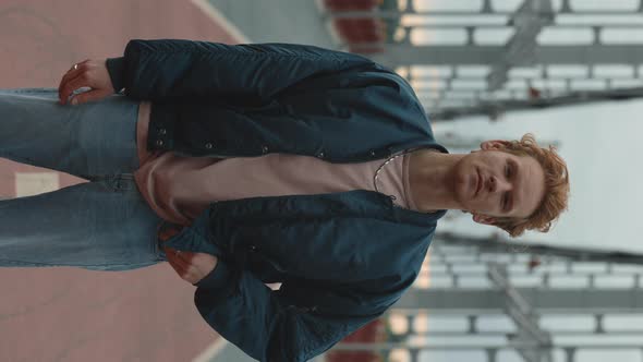 Portrait of Redhead Man Standing on City Street