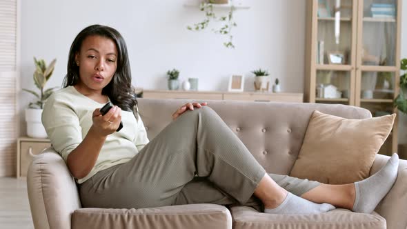 Young Woman Watching TV alt