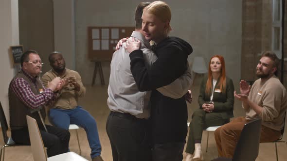 Couple Having Reconciliation at Support Group Therapy alt