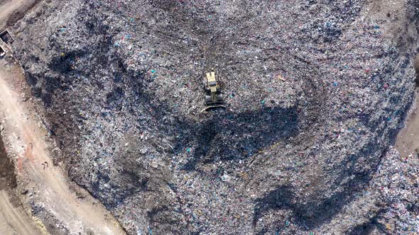 Flying Over a Large Garbage Pile alt