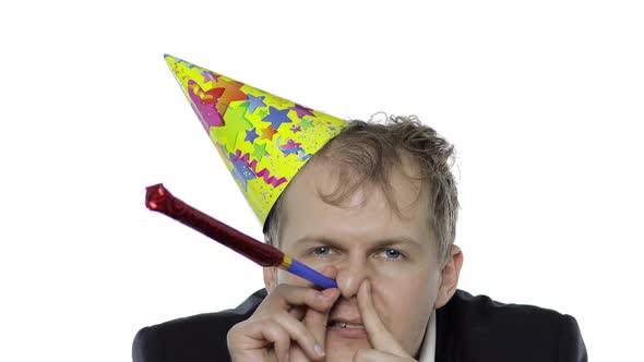 Drunk Sleepy Young Businessman In Festive Cap Blowing A Whistle Hangover Stock Footage