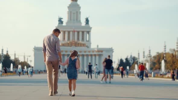 Father and daughter at VDNKh alt