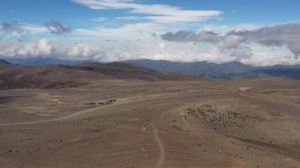 Aerial view of a large plain and the entrance to chimboraso vulcano in ecuador south america alt