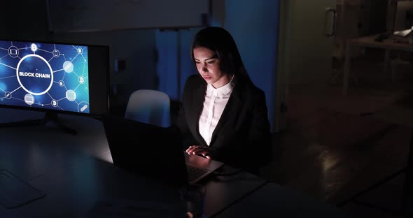 Young trader woman working inside hedge fund office doing blockchain research alt