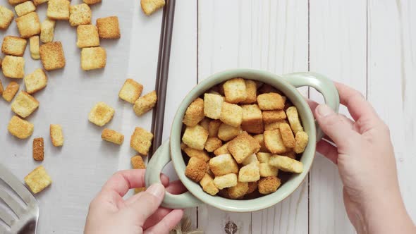 Fresh french toast croutons in the bowl. alt