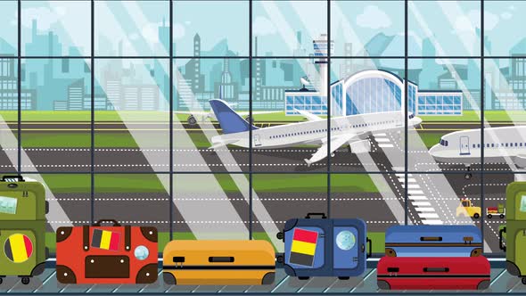 Suitcases with Belgian Flag Stickers on Baggage Carousel alt