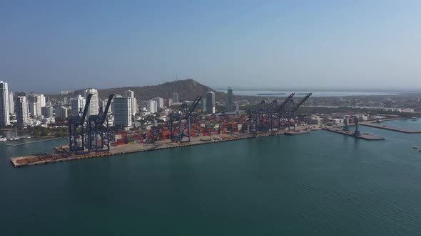 The Aerial View on Port Cranes and Cargo Terminal in Harbor of Cartagena Colombia