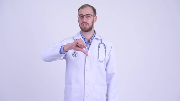 Stressed Bearded Man Doctor Giving Thumbs Down