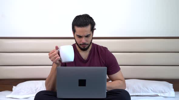 Indian man working from home alt