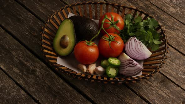 Rotating shot of beautiful, fresh vegetables on a wooden surface - BBQ 117 alt
