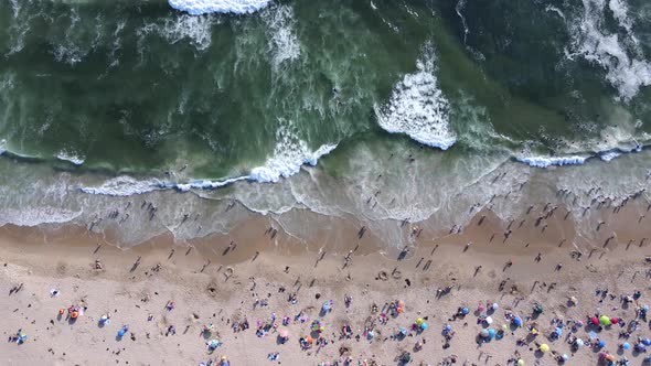 Aerial view of the beach in slow motion alt