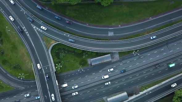 Aerial View Flying Over of Loaded Cars with Traffic Jam at Rush Hour on Highway with Bridge