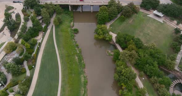 Aerial view of the Buffalo Bayou that runs throughout all of Houston. This video was film in 6k and alt