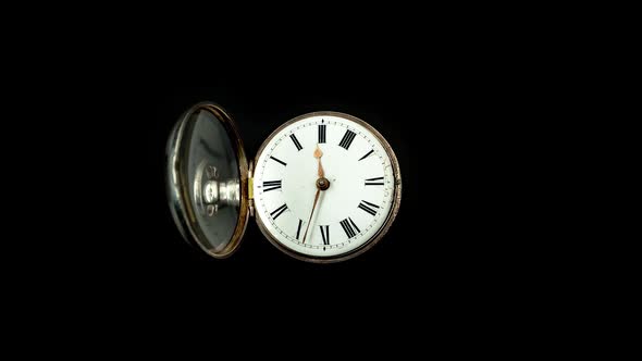 Vintage Pocket Watch Rotate Arrows Go. Black Background. Time Lapse alt