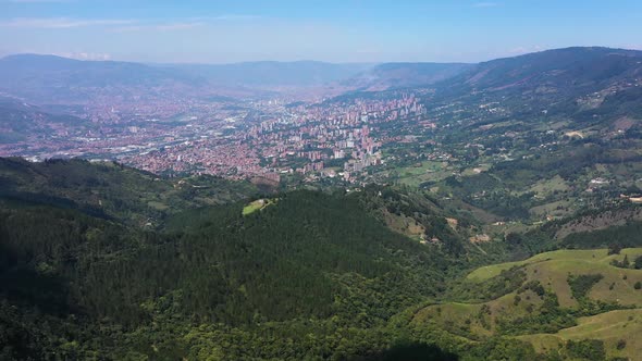 Contrast Between Rural and Urban Medellin Aerial View alt