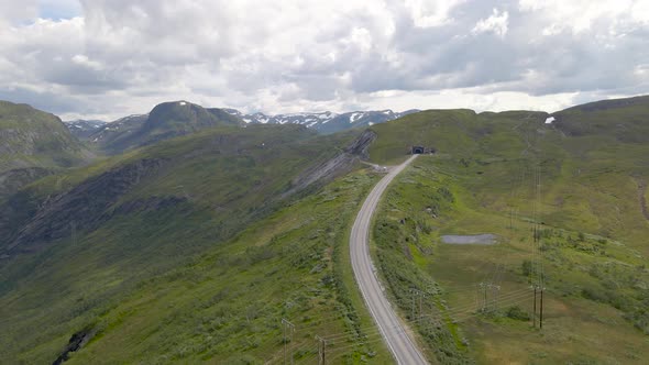 Drone View Of Vikafjell Mountain Road With Tunnel In Vik i Sogn, Norway ...